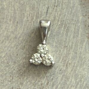 Elegant Silver Pendant with Triple Diamond Design